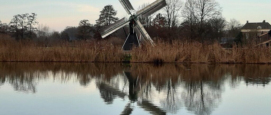 Typical Dutch windmill pumping water, Oude Ijssel, Achterhoek, Gelderland