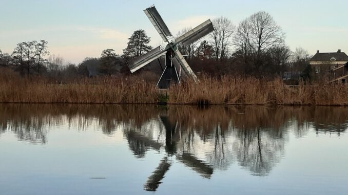 Typical Dutch windmill pumping water, Oude Ijssel, Achterhoek, Gelderland